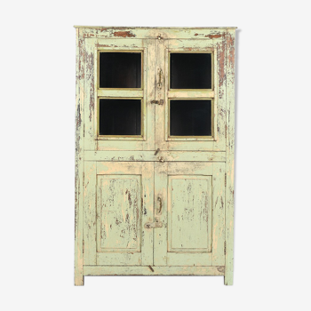 Patinated wooden glass cabinet