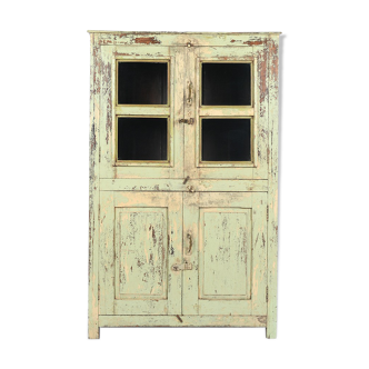 Patinated wooden glass cabinet
