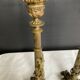 Pair of 19th-century gilded bronze candlesticks in Empire style.
