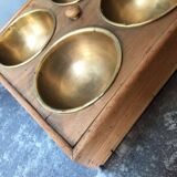 Wood and brass vacuum