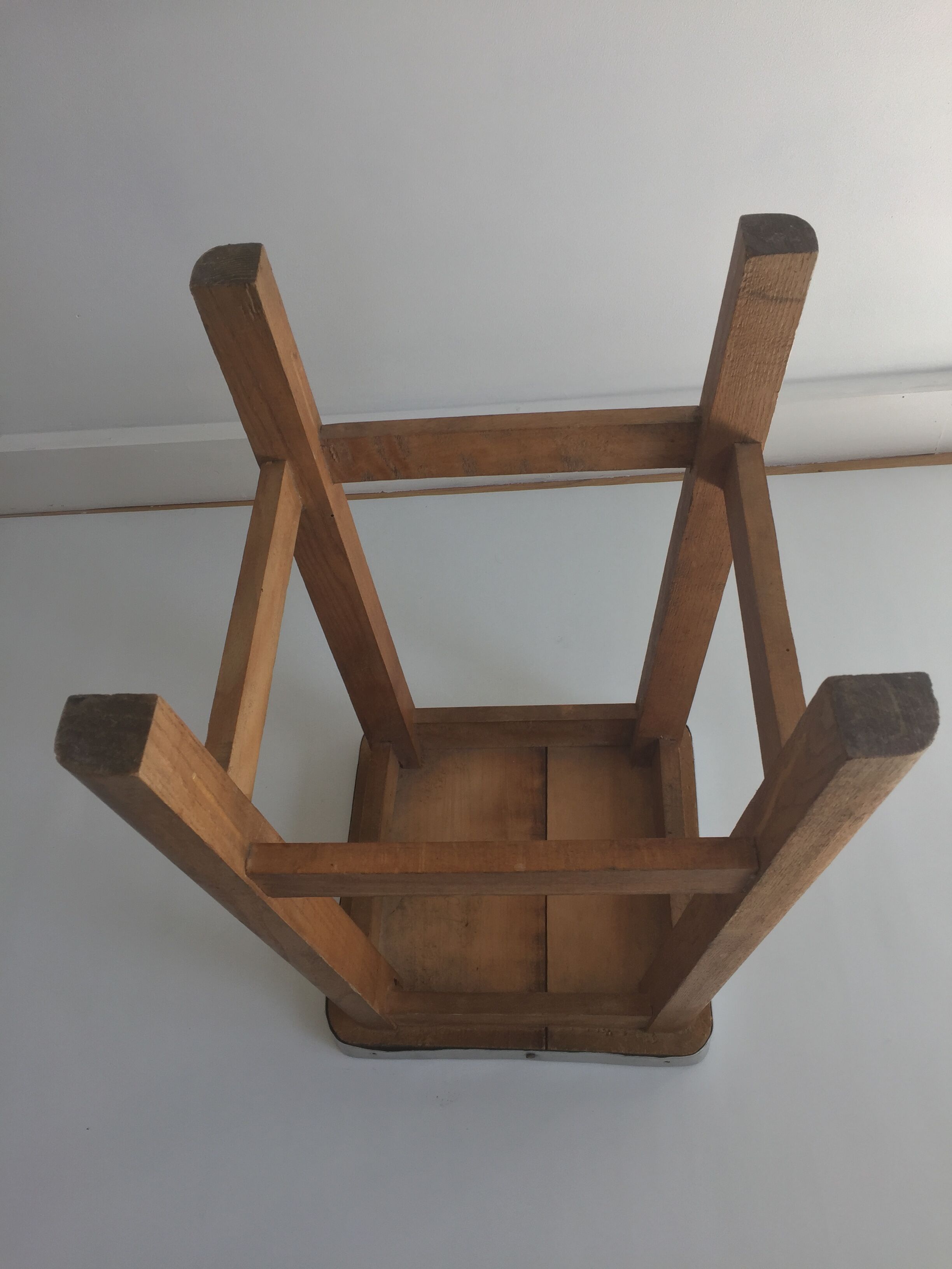 Wooden stool and green seat