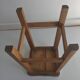 Tabouret en bois et assise verte