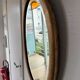 Miroir doré ovale ancien glace biseautée