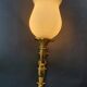 Three large vintage torch wall sconces.