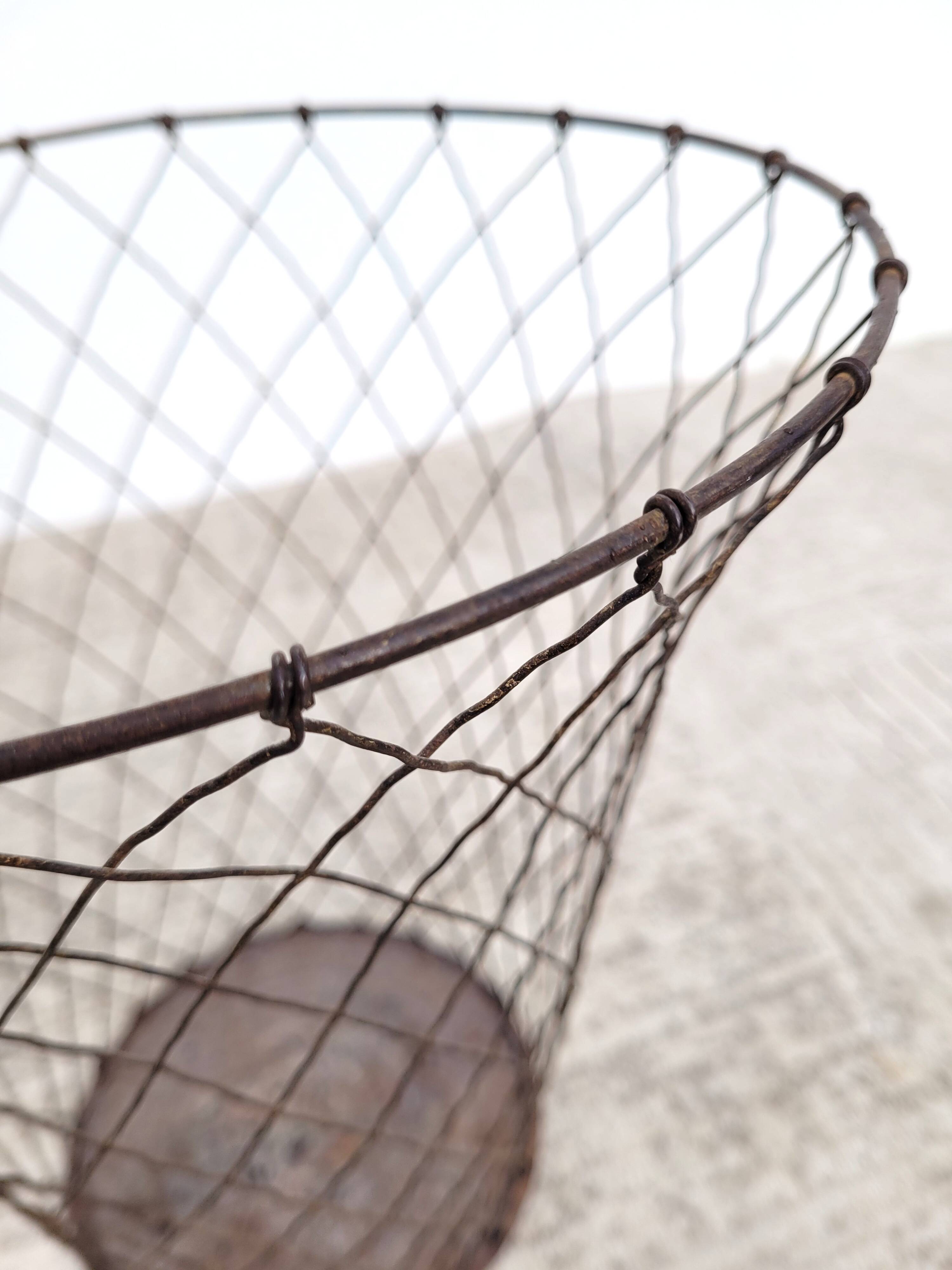 Old wire mesh wastebasket