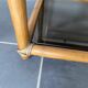 Vintage 1950s rattan and glass TV storage unit.