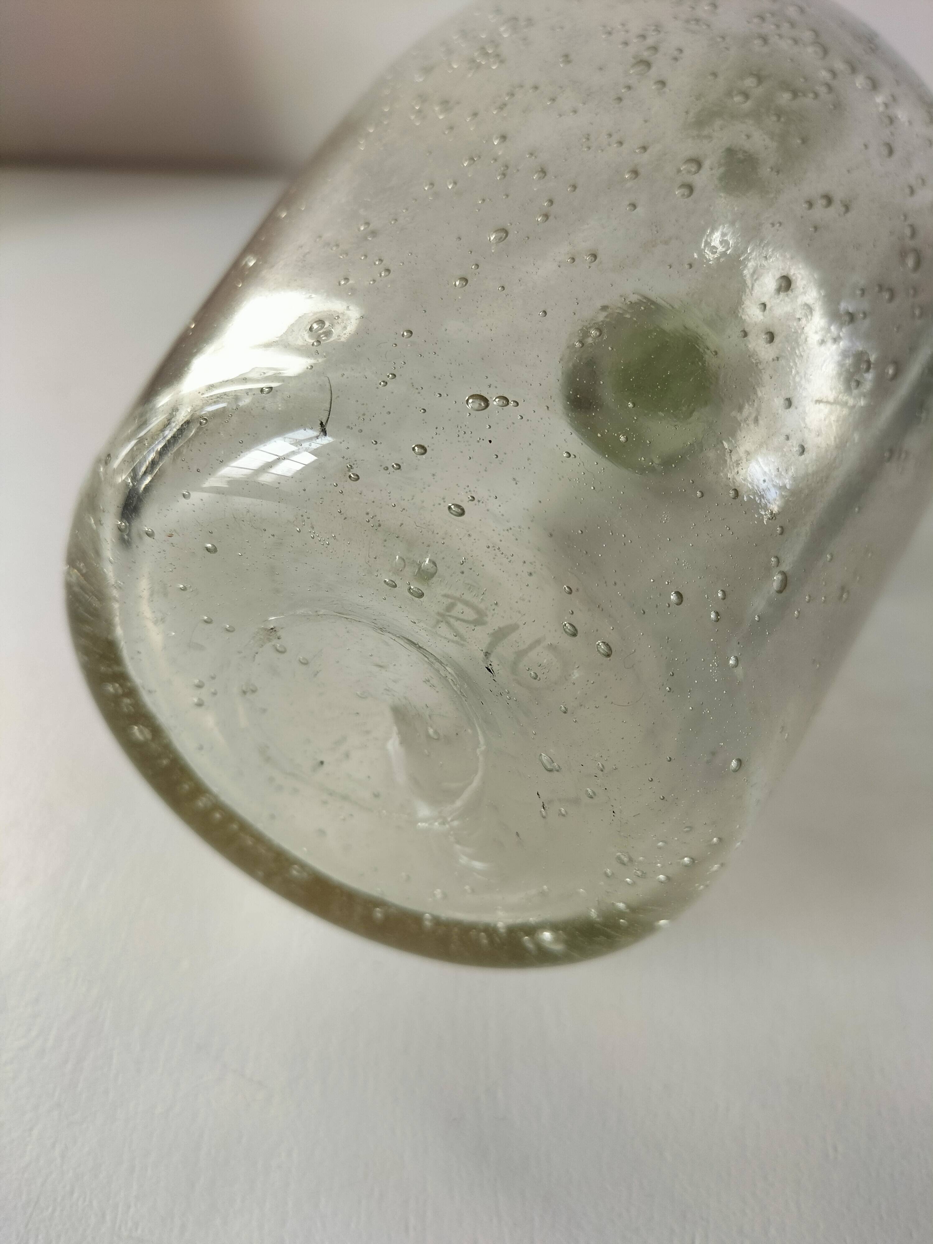 Bubble glass carafe bottle signed Biot in lime green colour.