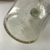 Bubble glass carafe bottle signed Biot in lime green colour.