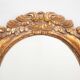 Oval mirror in gilded and carved wood. Vintage mirror. Wall mirror.