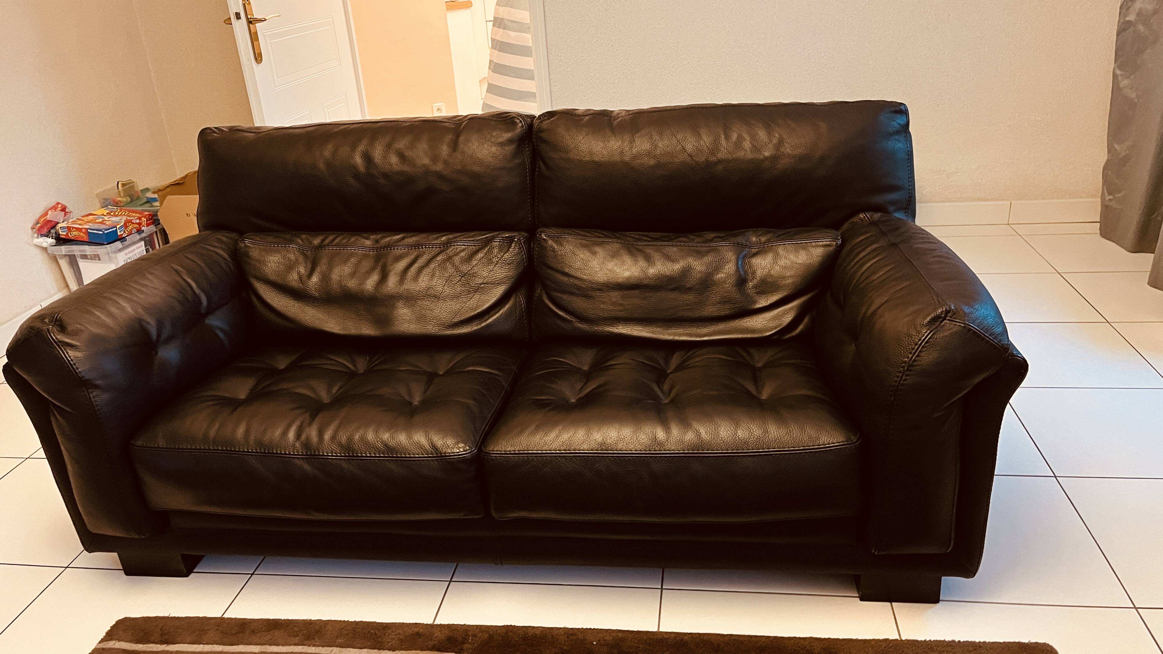 Rococo leather sofa by Roche Bobois