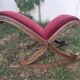 50s footrest in red velvet and scuplented wood