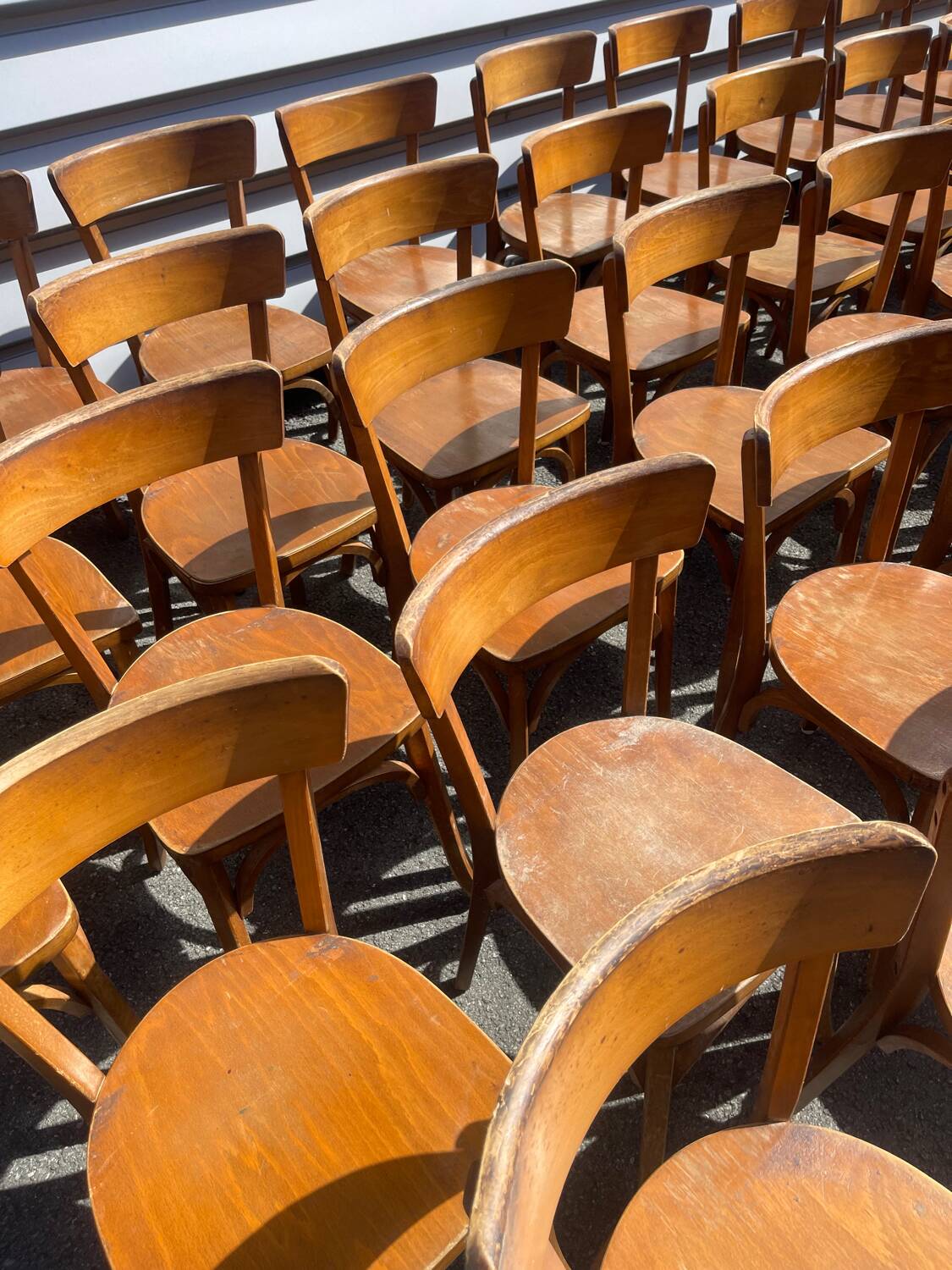 Lot of 60 wooden bistro chairs from the Baumann 1970s