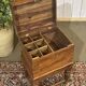 Teak bottle cabinet on legs in marine style