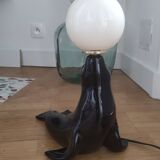 Vintage black sea lion lamp