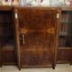 Important Art Deco library in amboyna and mahogany veneer.