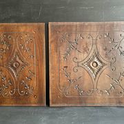 Pair of antique decorative panels in carved wood, late 19th century.