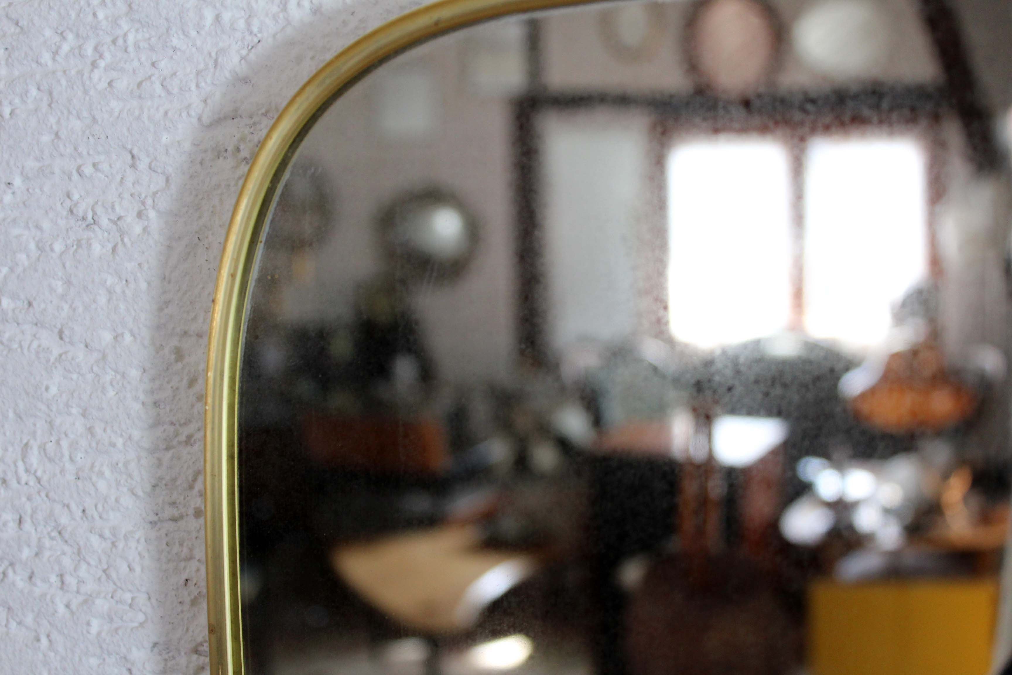 Asymmetrical mirror brass 60x31cm