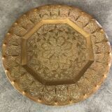 Oriental brass tray with chiseled decoration of arabesques and flowers