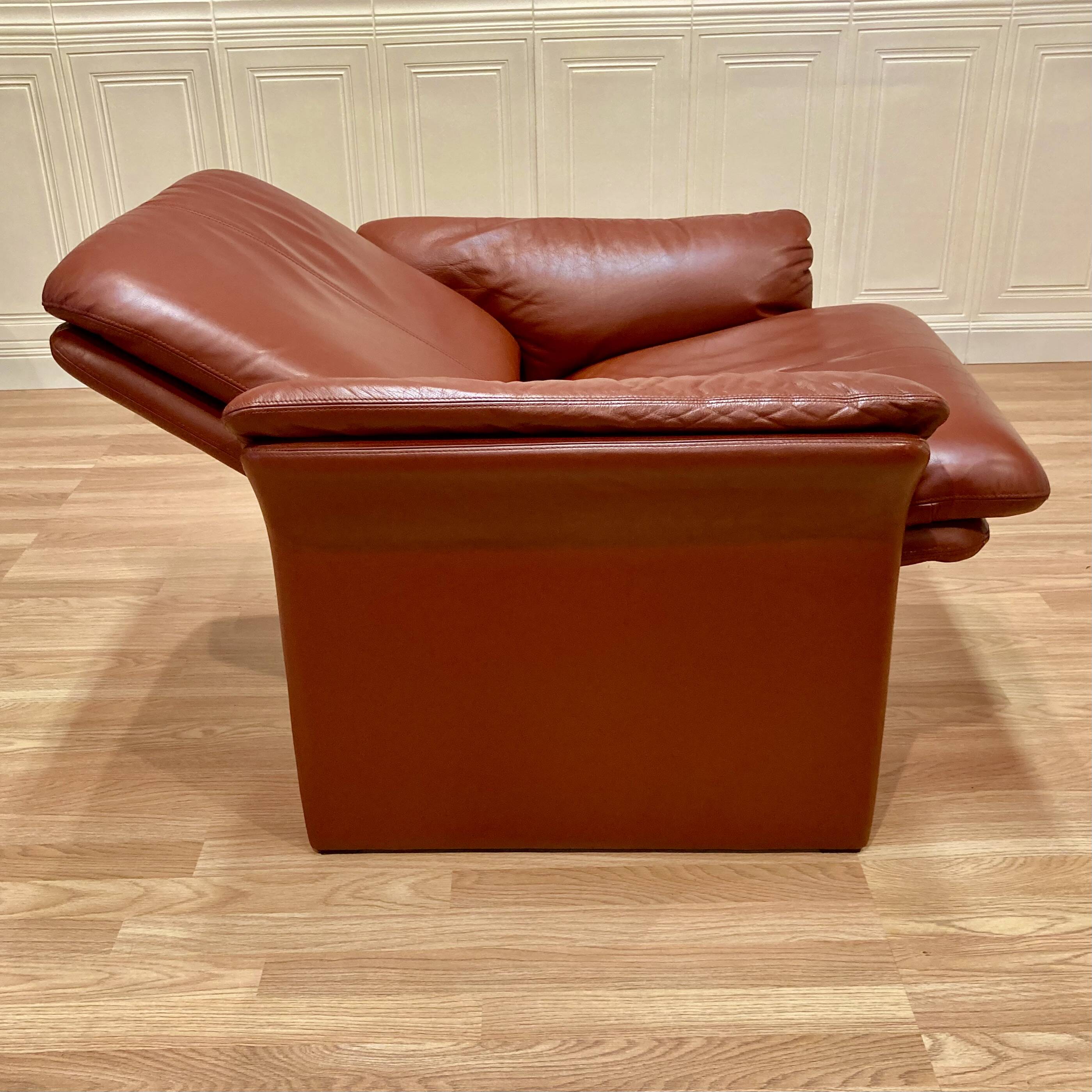 Pair of "Erpo" designer adjustable leather armchairs.