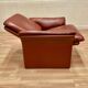 Pair of "Erpo" designer adjustable leather armchairs.
