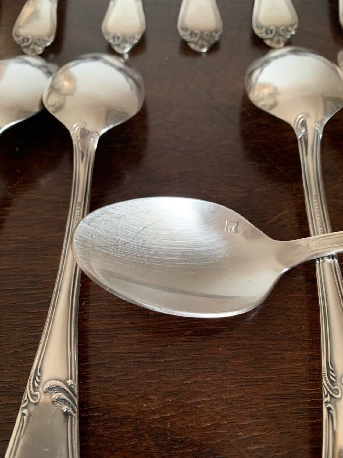 12 small silver metal spoons