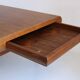 Danish teak wooden coffee table with hidden compartments, by Johannes Andersen for Trioh