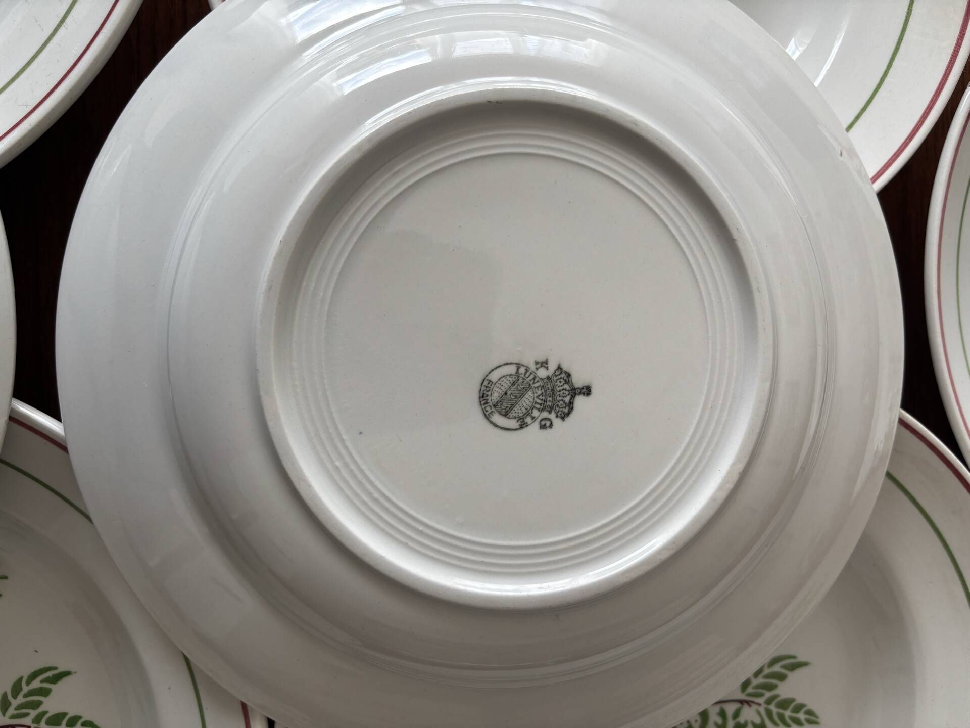 Set of 8 antique deep plates KG Lunéville, floral berry decoration.