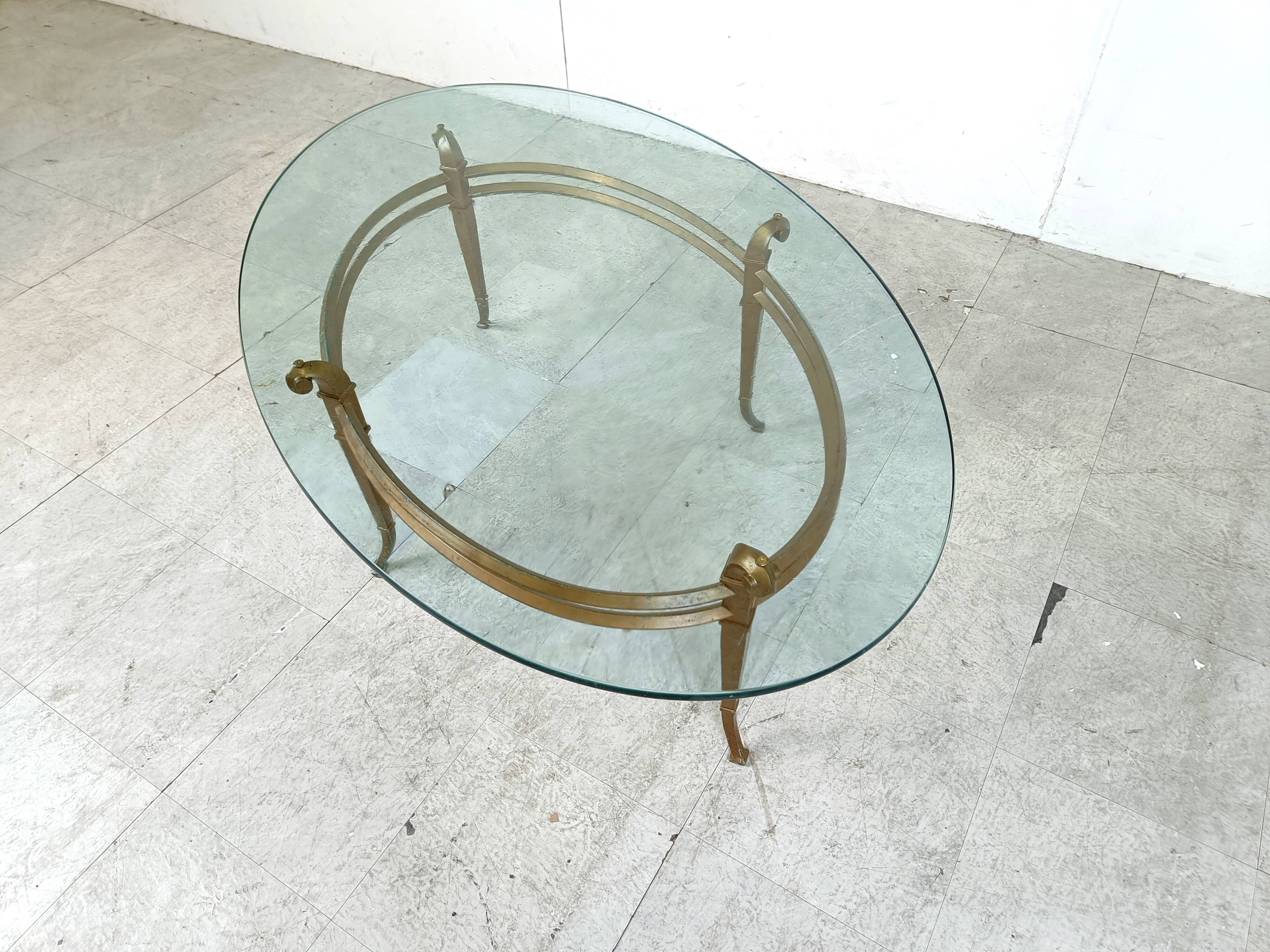 Vintage golden metal and oval glass coffee table, 1970s