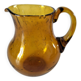 Small bubbled glass jug from Biot in golden yellow.