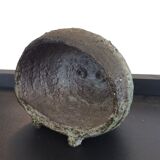 Empty pocket on vintage ceramic stand