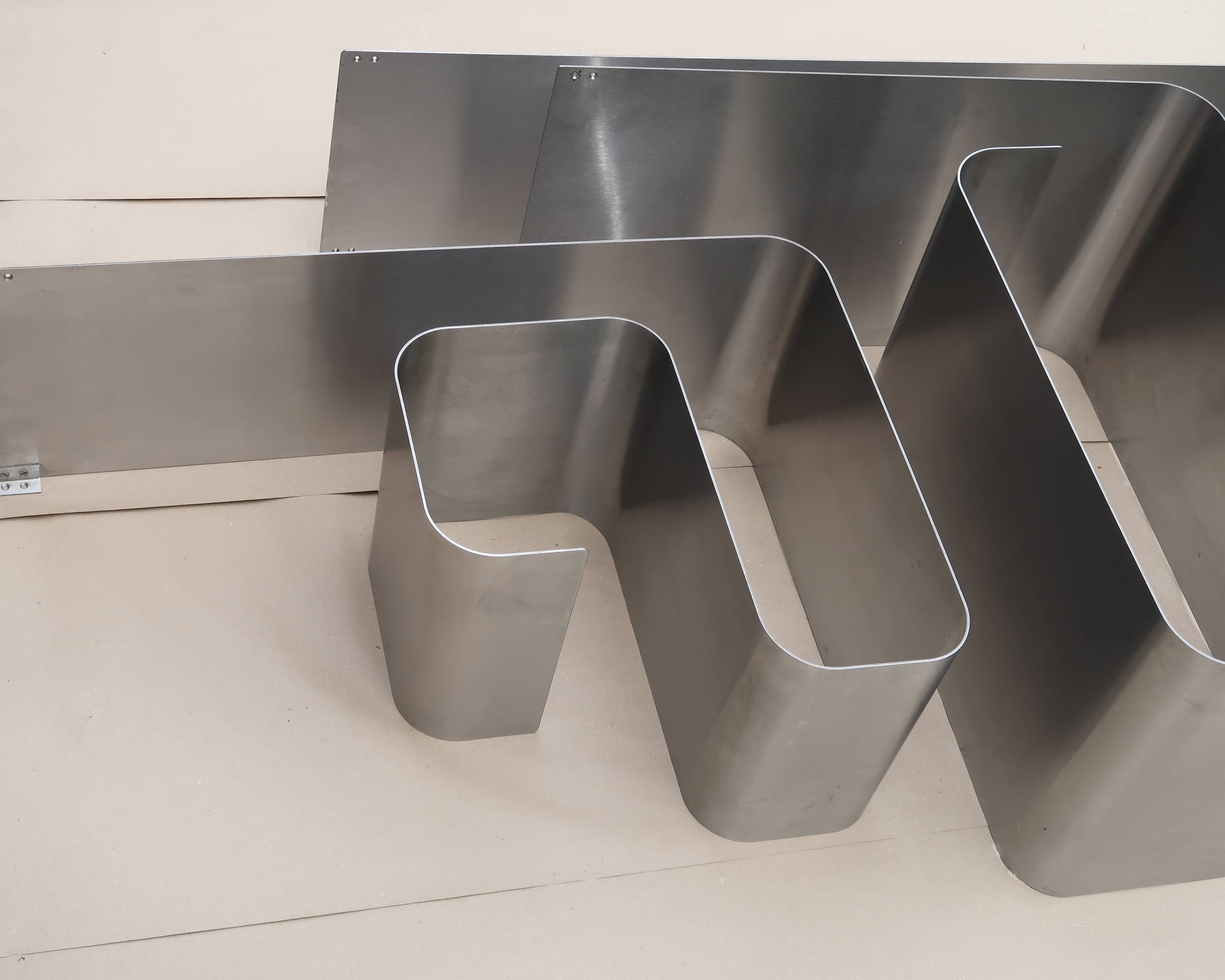 Zig Zag bookshelf by Joelle Ferlande and François Monnet in steel