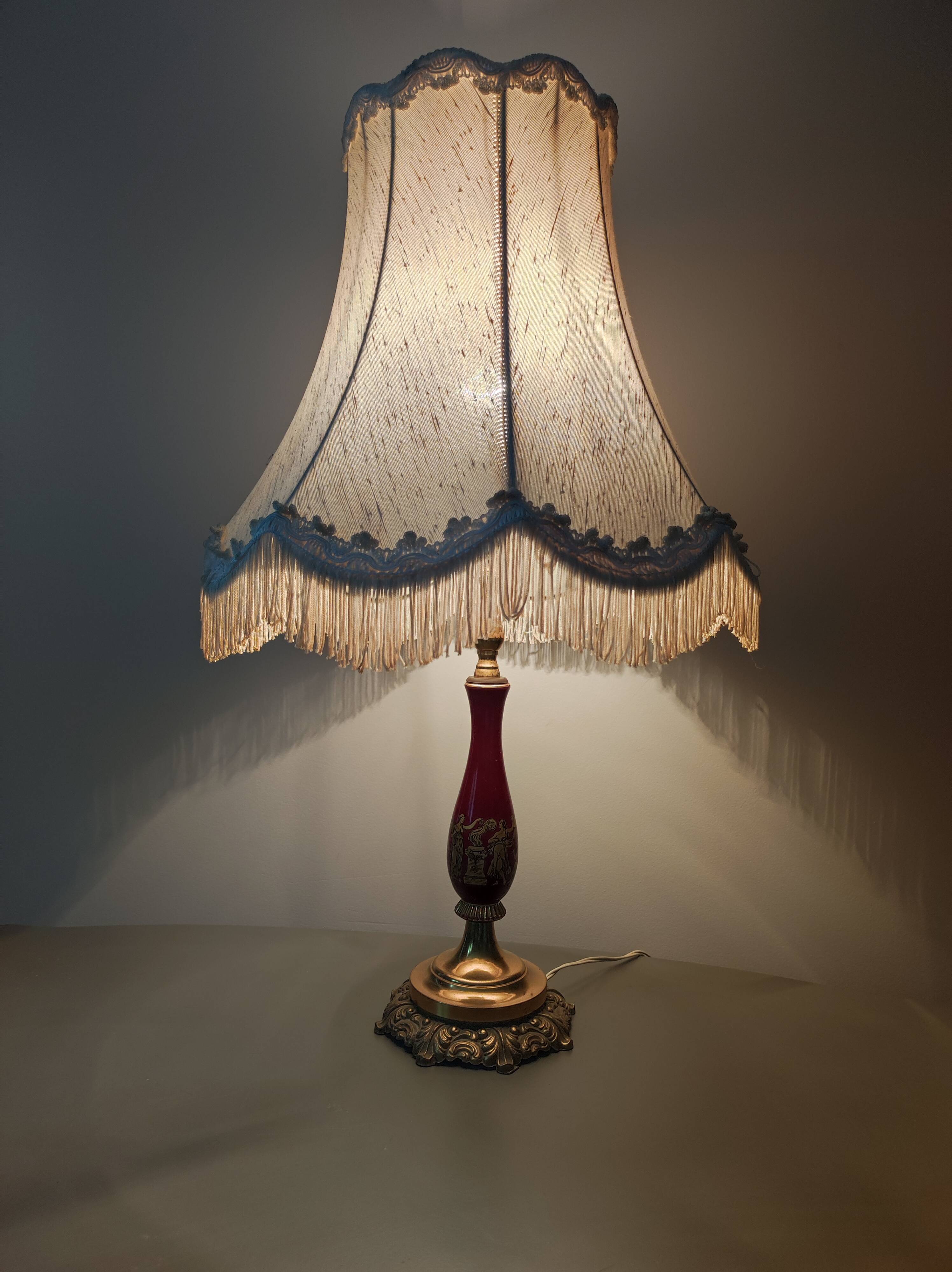 Chiseled bronze foot lamp