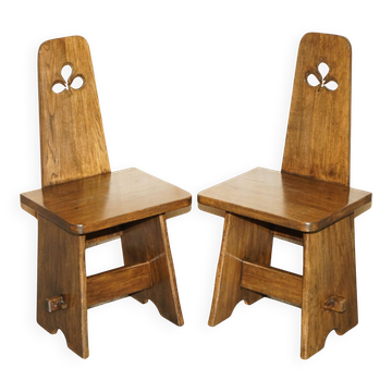 Pair of Victorian Arts and Crafts chairs with four boards.