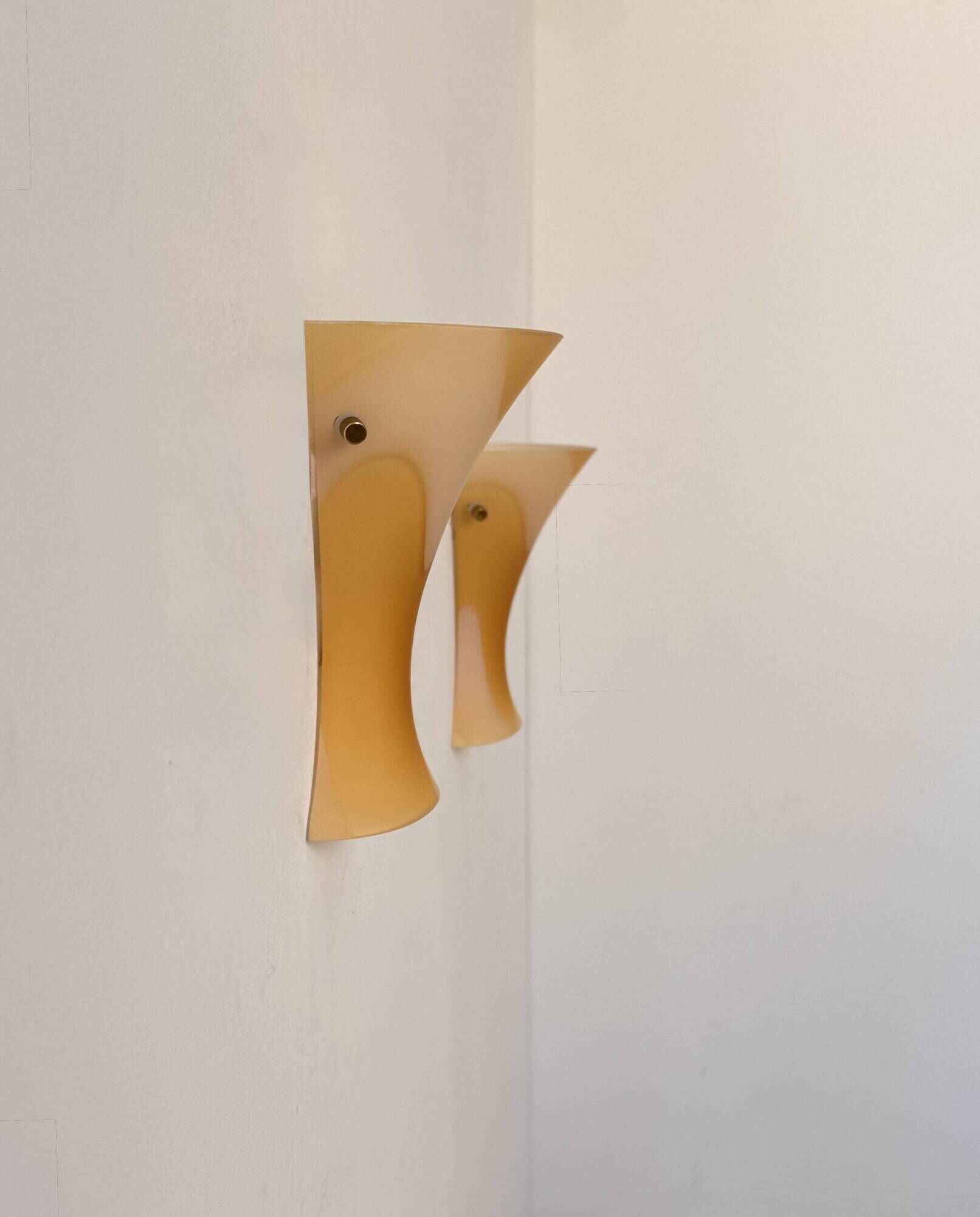 Pair of vintage wall lights with orange glass and brass, Italy 1980.
