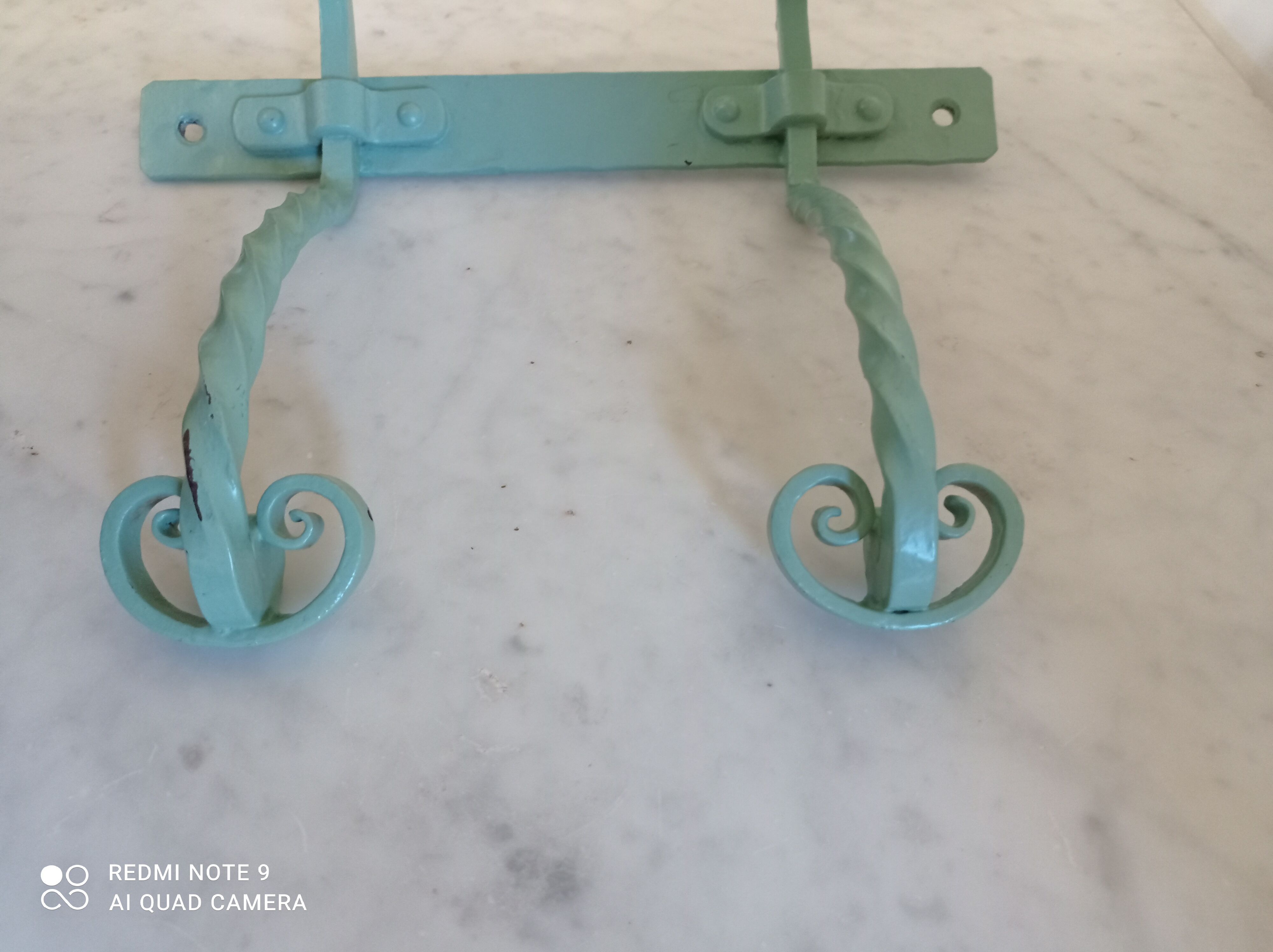 Double wrought iron coat hooks