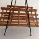 Mid-century black metal and wicker magazine rack, 1960, Germany