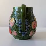 Carafe of water in slush with fruits