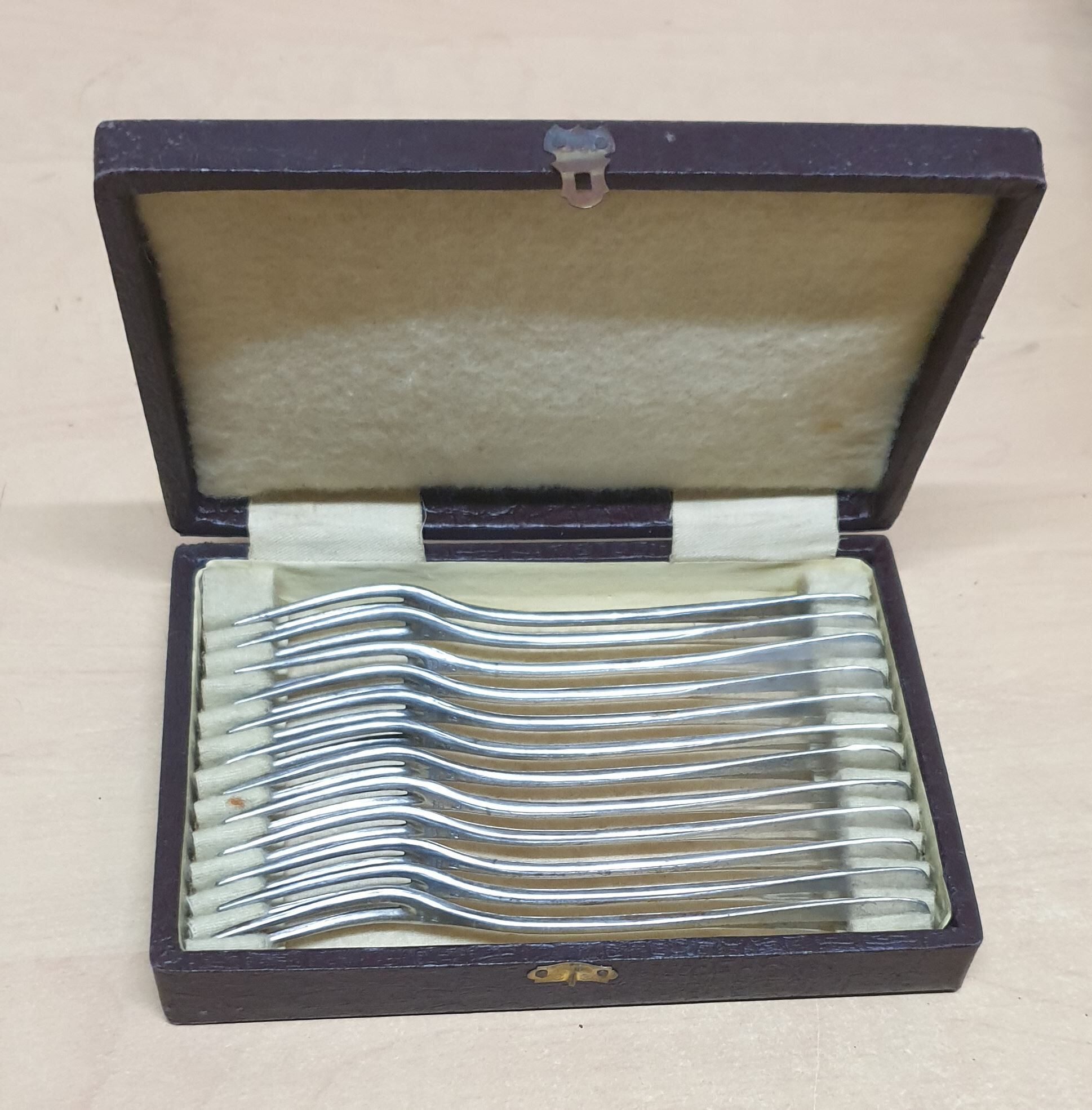 12 silver metal snail forks