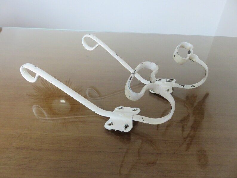 Pair of white metal hooks 30s 40s
