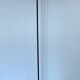 Vintage halogen floor lamp in black lacquered metal and brass ball joint