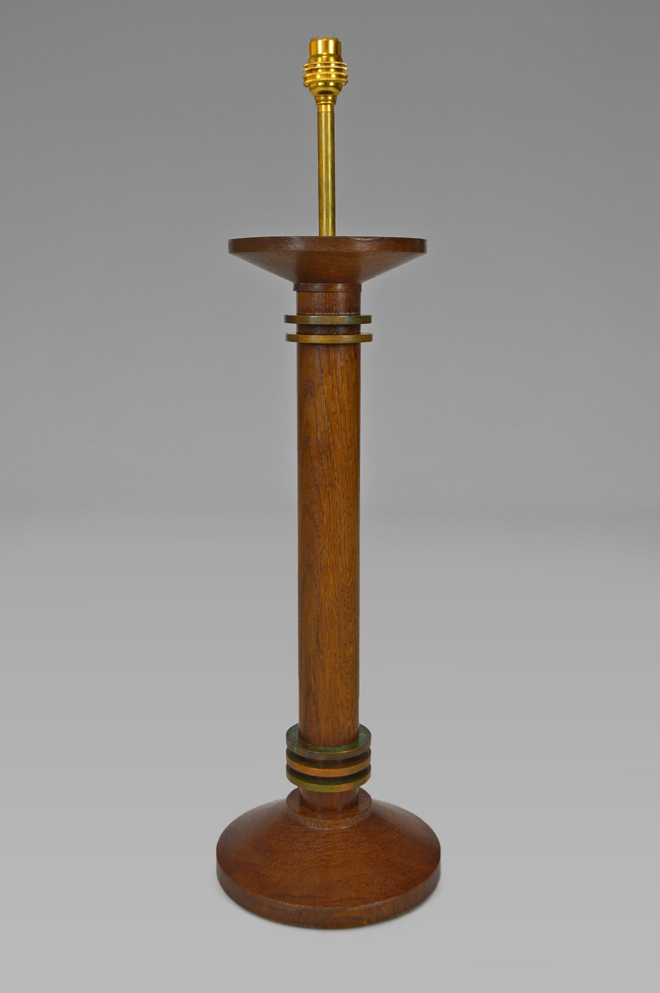 Pair of art deco lamps in wood and patinated bronze around 1930
