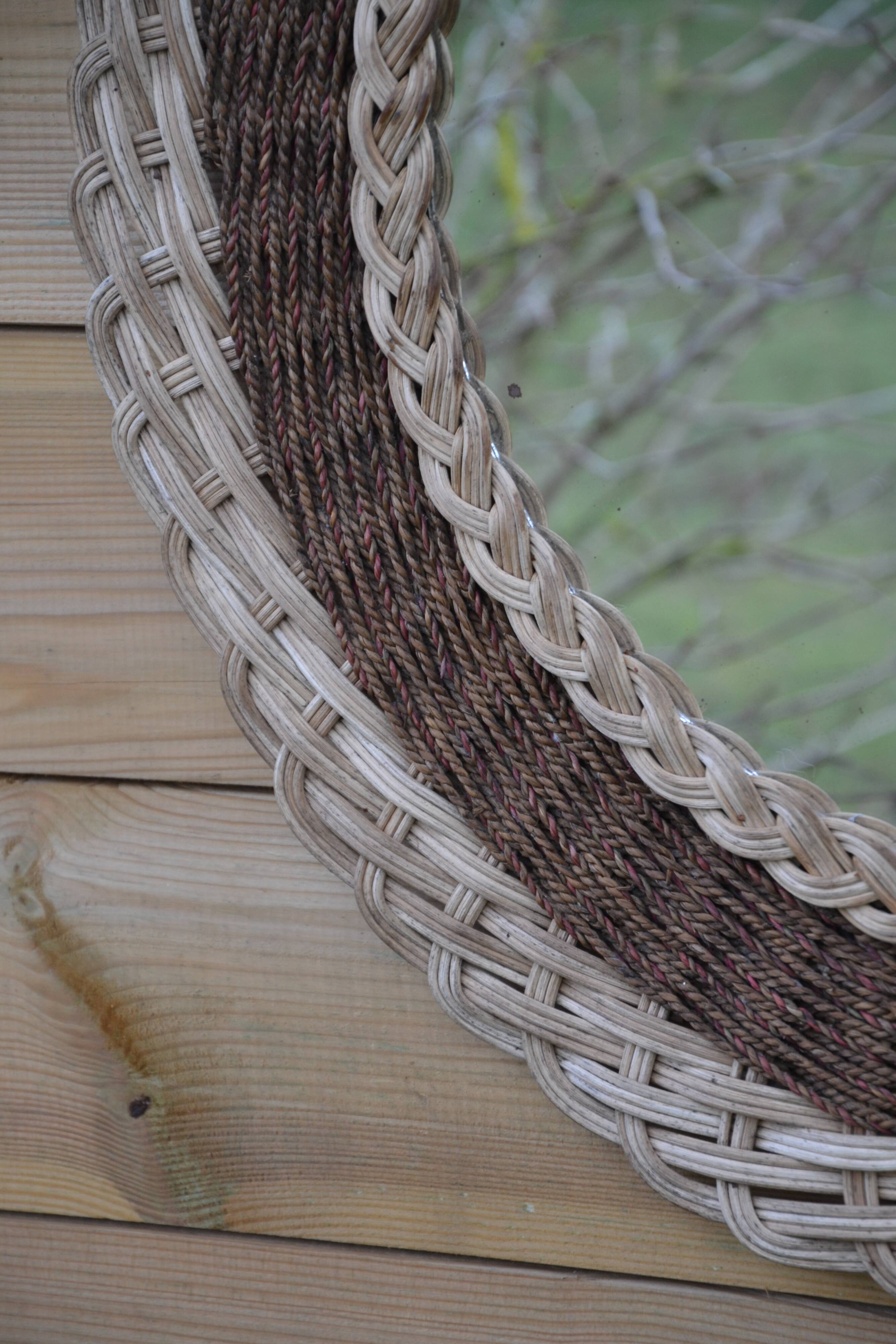 Round woven rattan mirror with rope from the 1970s.