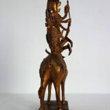 Golden bronze statue of Shiva on Nandi, India, mid-20th century.