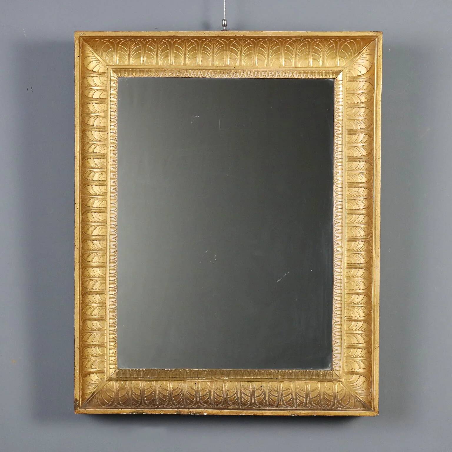 Antique Empire mirror in gilded wood, Italy, 19th century.