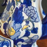 Cobalt blue teapot with flower pattern. Hexagonal teapot