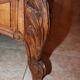 Walnut rocaille bed from the early 20th century.