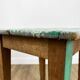 Old wooden slot stool