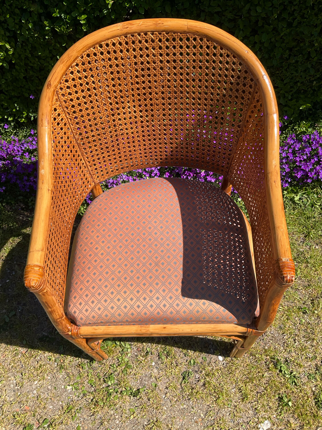 Mc Guire style armchair in rattan and caning from the 1980s.