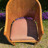 Mc Guire style armchair in rattan and caning from the 1980s.