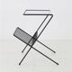 Filigree mid-century modern side table with magazine rack / steel / glass / 1960s